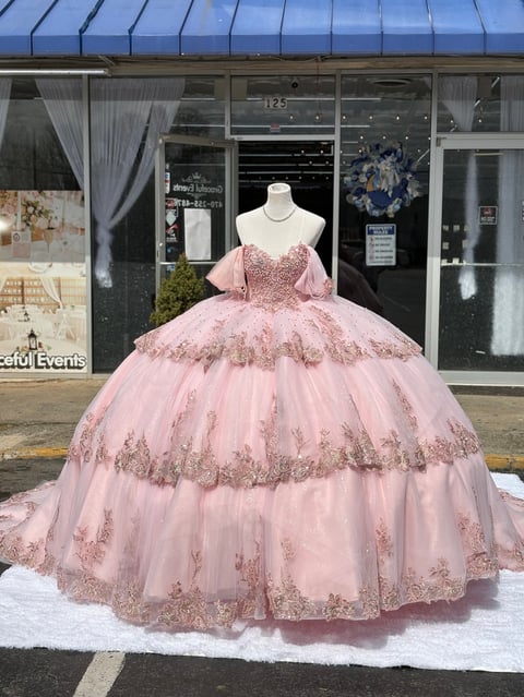 Elegant pink ball gown with beaded details